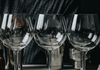 Ice in a glass of wine prepared for a special cocktail for a bartender's bar or restaurant.
