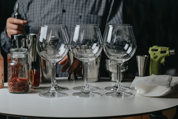 Ice in a glass of wine prepared for a special cocktail for a bartender's bar or restaurant.