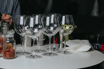 Ice in a glass of wine prepared for a special cocktail for a bartender's bar or restaurant.