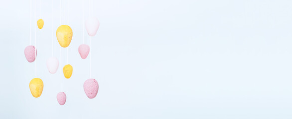 Amazing Easter festive banner with eggs. Selective focus. Easter eggs hunt invitation. Soft toning, Copy space.