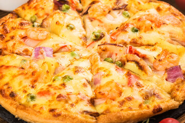 tasty fresh pizza with seafood table (2)