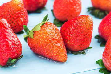 bunch fresh strawberries wooden board background (5)