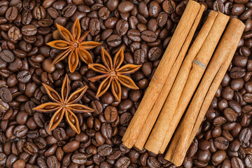 top view cinnamon sticks with coffee beans