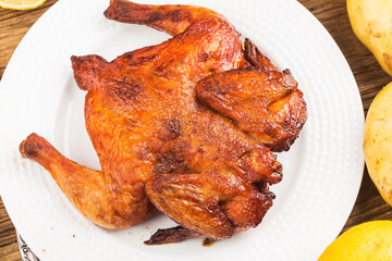 fresh roast chicken wooden board