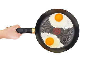 Fried eggs in a pan. Frying pan with fried eggs in hand isolated on white background.