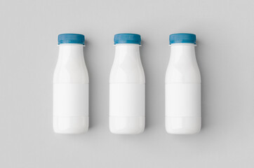 White plastic yogurt or milk bottle mockup with blank label.