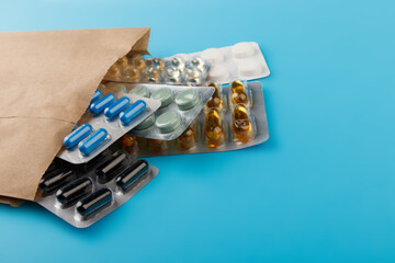 Different medicines: tablets, pills in blister pack, medications drugs, macro, copy space
