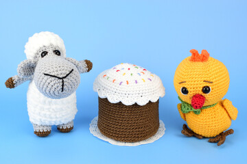 Knitted items, symbols of Easter - lamb, chicken and cake