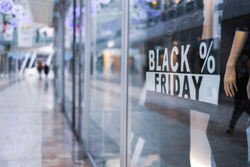 black friday sign on store display background in a mall during christmas holidays