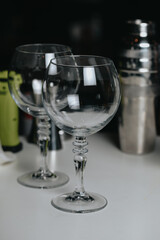 Background image with bartender prepared glasses for champagne cocktail on a table in bar or restaurant.