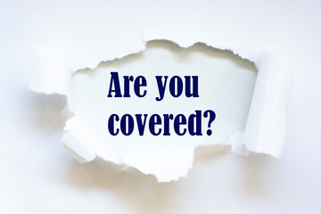 Are you covered - question written on white paper in white envelope