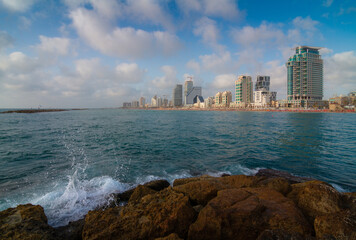 Fototapeta na wymiar Tel Aviv: view of the city's coastline and sea waves