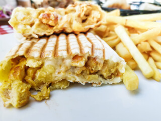 Beef tacos served with golden French fries