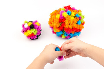 elements of children's designer of Velcro in kid  hands,isolated on white background