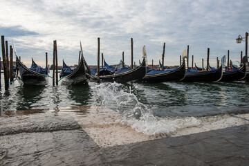 Fototapeta na wymiar Venice, Italy - 2 november 2018: view on gondola during acqua alta