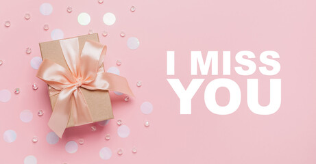 Gifts on pink background, love and valentine concept with text I miss you