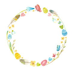 Spring wreath with Easter eggs, pussy willow, feathers and flowers. 