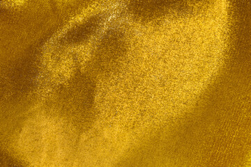 Gold shiny fabric background