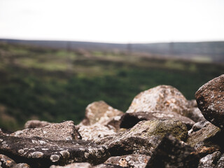 Stone wall in the foreground. 