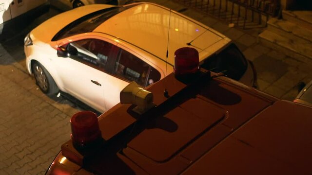 Night top view of fire truck with alarm and signal light on the roof.