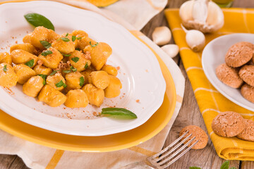 Pumpkin gnocchi with grated amaretti cookies. 