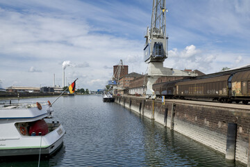 Karlsruhe, Germany: port of Karlsruhe with river rhine, ships, cranes and storage buildings