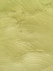 Close Up Photo of Textured Green Decorative Plaster Wall