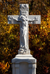 crosses with a crucifix on the grave.