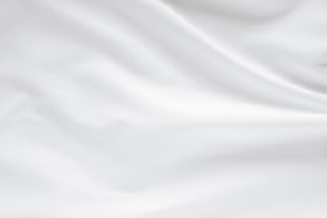 Fototapeta premium Abstract white fabric texture background. Cloth soft wave. Creases of satin. silk and cotton.