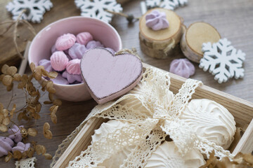 Festive decorated food composition with zephyr and meringue