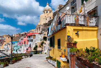 Fototapeta na wymiar View of the colorful houses at the Port of Corricella in Procida Island