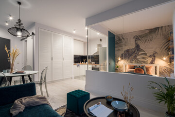 Small and nice designed apartment with lights on