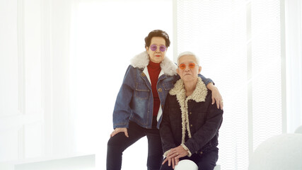 Asian senior fashion designers couple winter style jacket elder with style