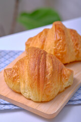 Warm Fresh Buttery Croissants and Rolls. French and American Croissants and Baked Pastries are enjoyed.