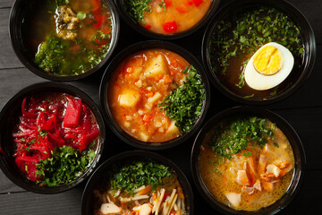 Business lunch in eco plastic container ready for delivery.Top view. Office Lunch boxes with food ready to go. Food takes away. Catering, brakfast