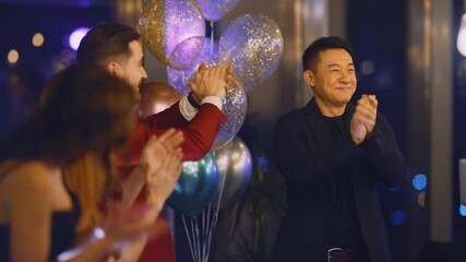 Formally Dressed Cheerful Business People Friends Congratulating Each Other and Applauding on Corporate Celebrating Holiday Night Party.