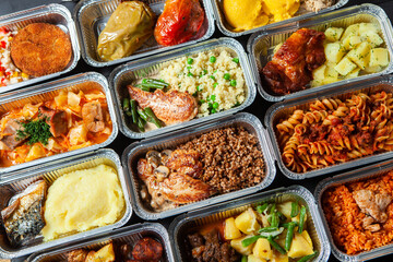 Business lunch in eco plastic container ready for delivery.Top view. Office Lunch boxes with food ready to go. Food takes away. Catering, brakfast.