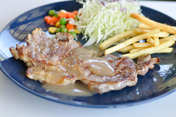 pork steak with French fries