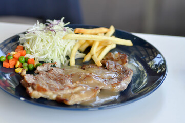 pork steak with French fries