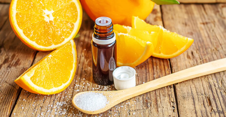 Citric acid on a wooden background. Selective focus.