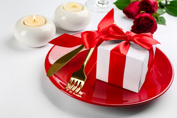 Beautiful table setting for Valentine's Day dinner on white background