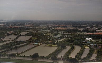 View of the surroundings of Bangkok from the plane. Thailand, 2019