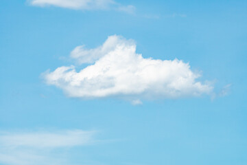 Naklejka na ściany i meble Blue sky background with clouds