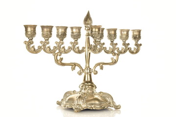 One metal candlestick, Hanukkah, close-up, for the holiday of Hanukkah, isolated on white.