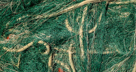 background of green fishing nets and floats
