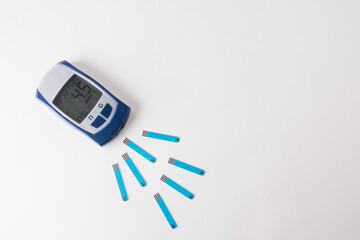 blood glucose meter on a white background. diabetes mellitus.