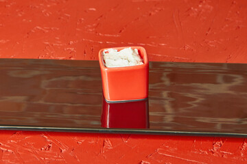 Portion of mayonnaise sauce, loft background