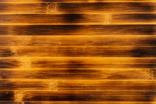 Abstract burnt bamboo wooden texture background. Close up of cutting board for background.