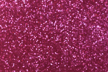 Pink abstract blured background with shimmer, glitter and shine. Merry Christmas or new year bokeh. Saint Valentine day card. Copy space