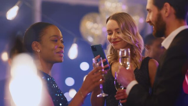 Joyful Caucasian Woman Celebrating Night Hangout with Corporate Friends. Excited Elegant Female Rejoicing Online Victory Winning Money Shouting for Success. Fun Concept.
